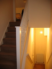 Our flat - view of front door and stairs up to living area